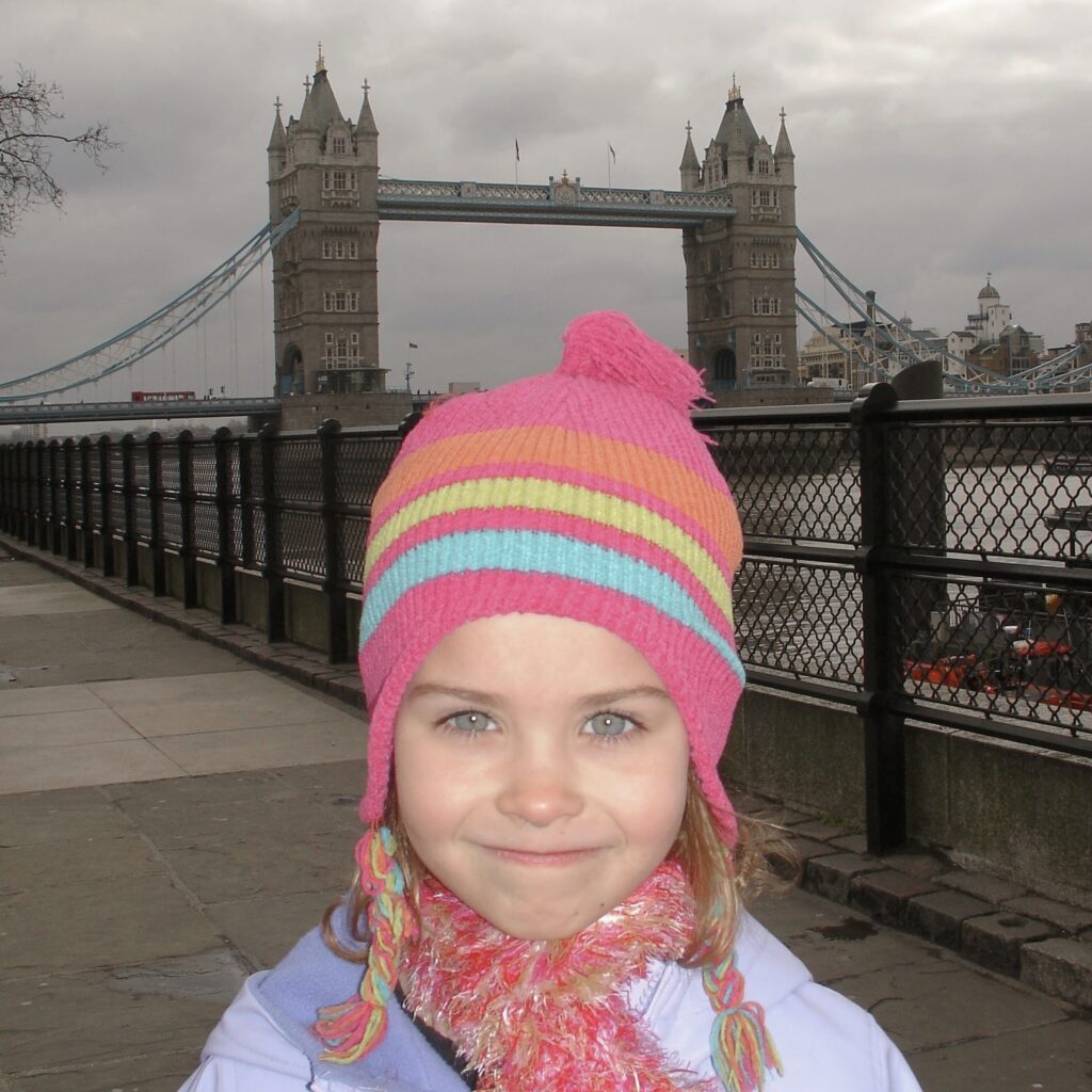 Hallie as a kid in front of the tower bridge in London